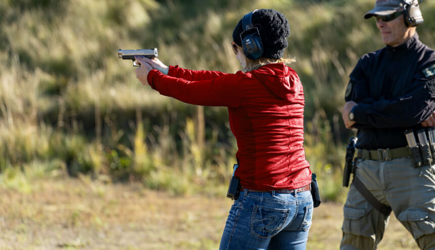 Woman attends a gun safety course with Steve McDaniel